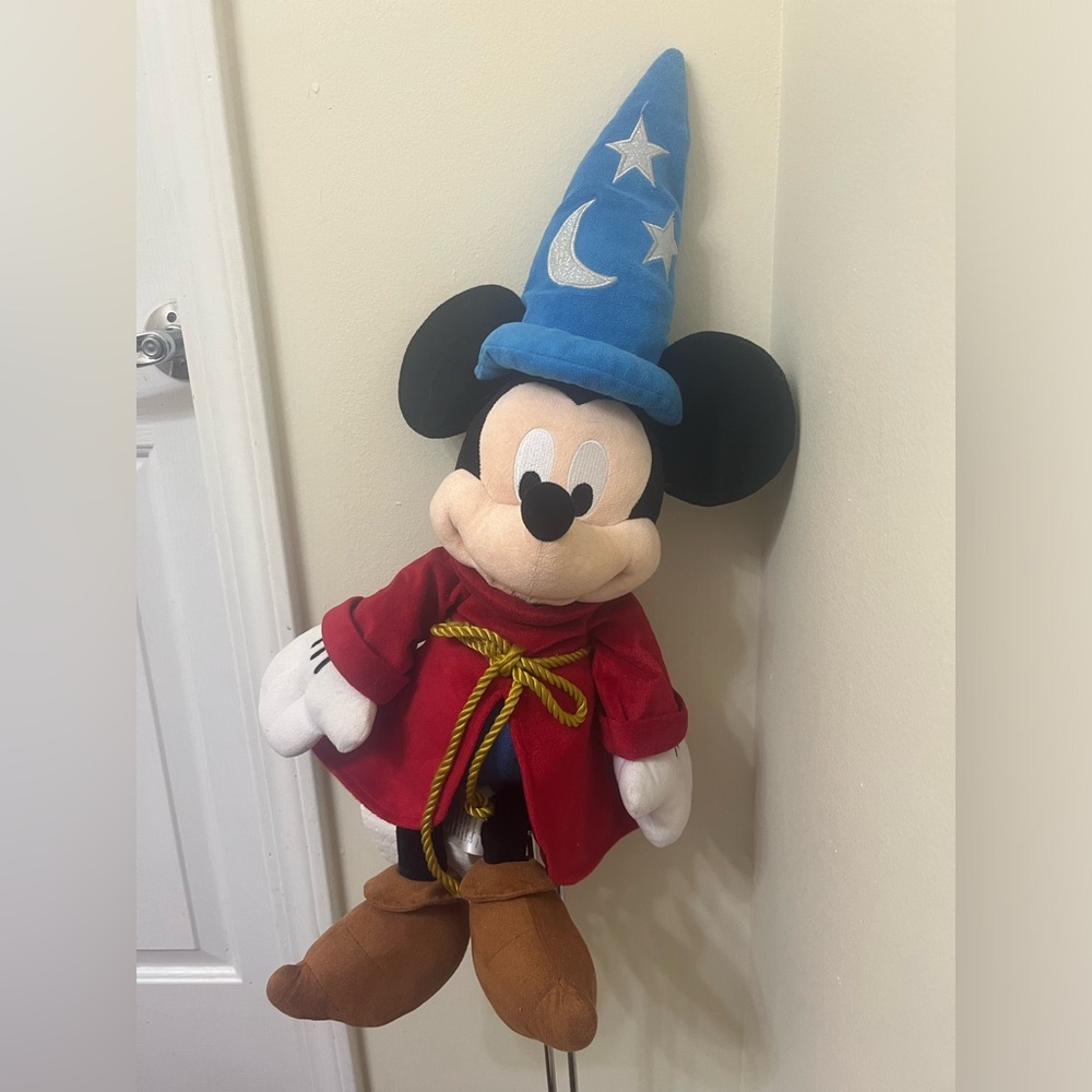 This is a sorcerer Mickey plush. He’s about 18 inches tall
